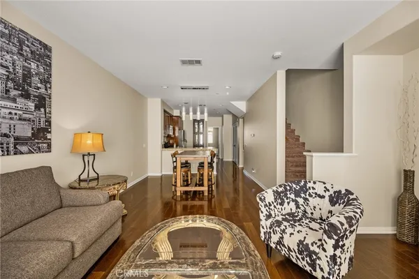 a living room with furniture and a couch