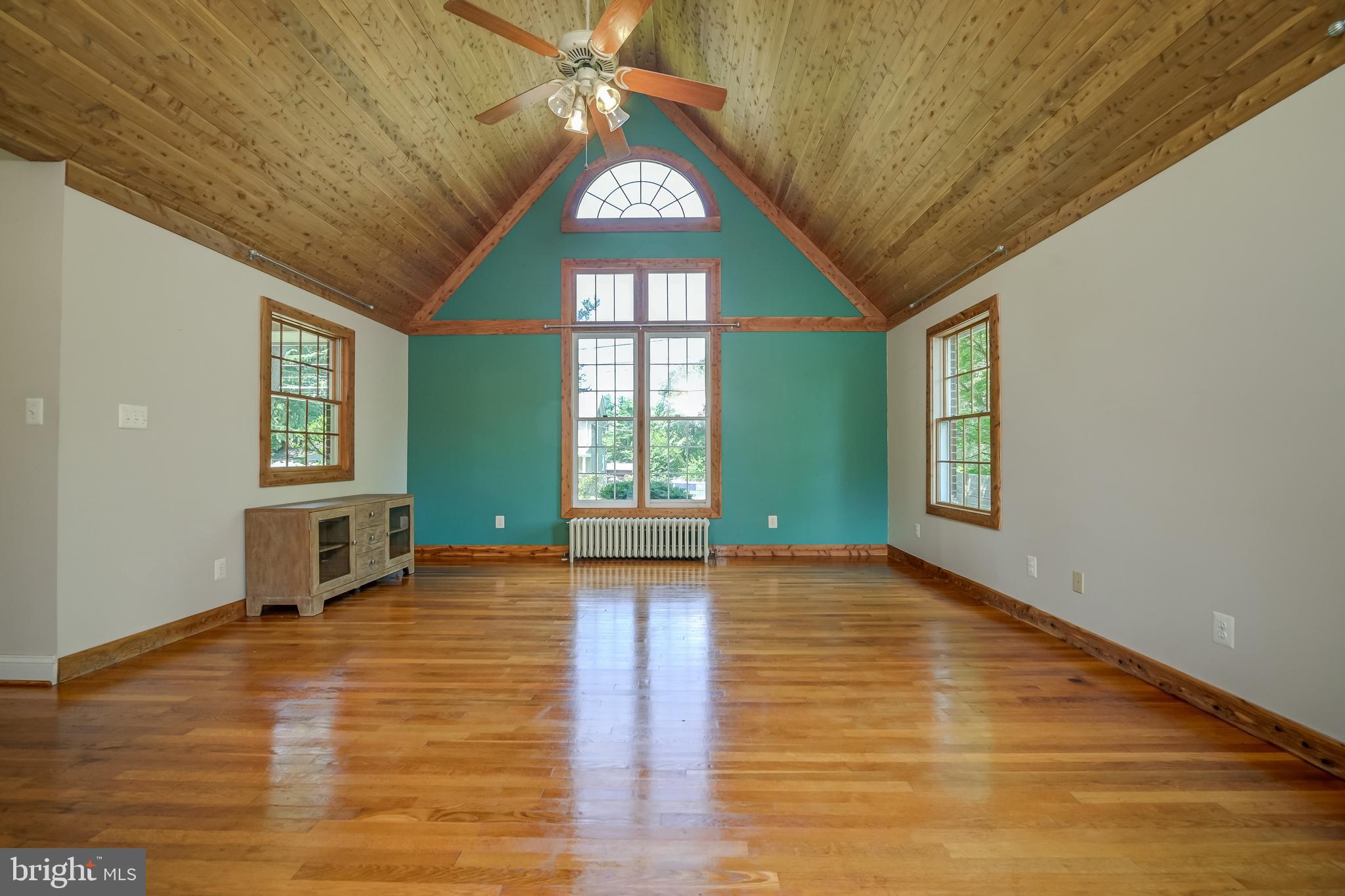 5 Lee Street Gaithersburg, MD 20877 - Photo 12 of 90 a view of an empty room with window and wooden floor