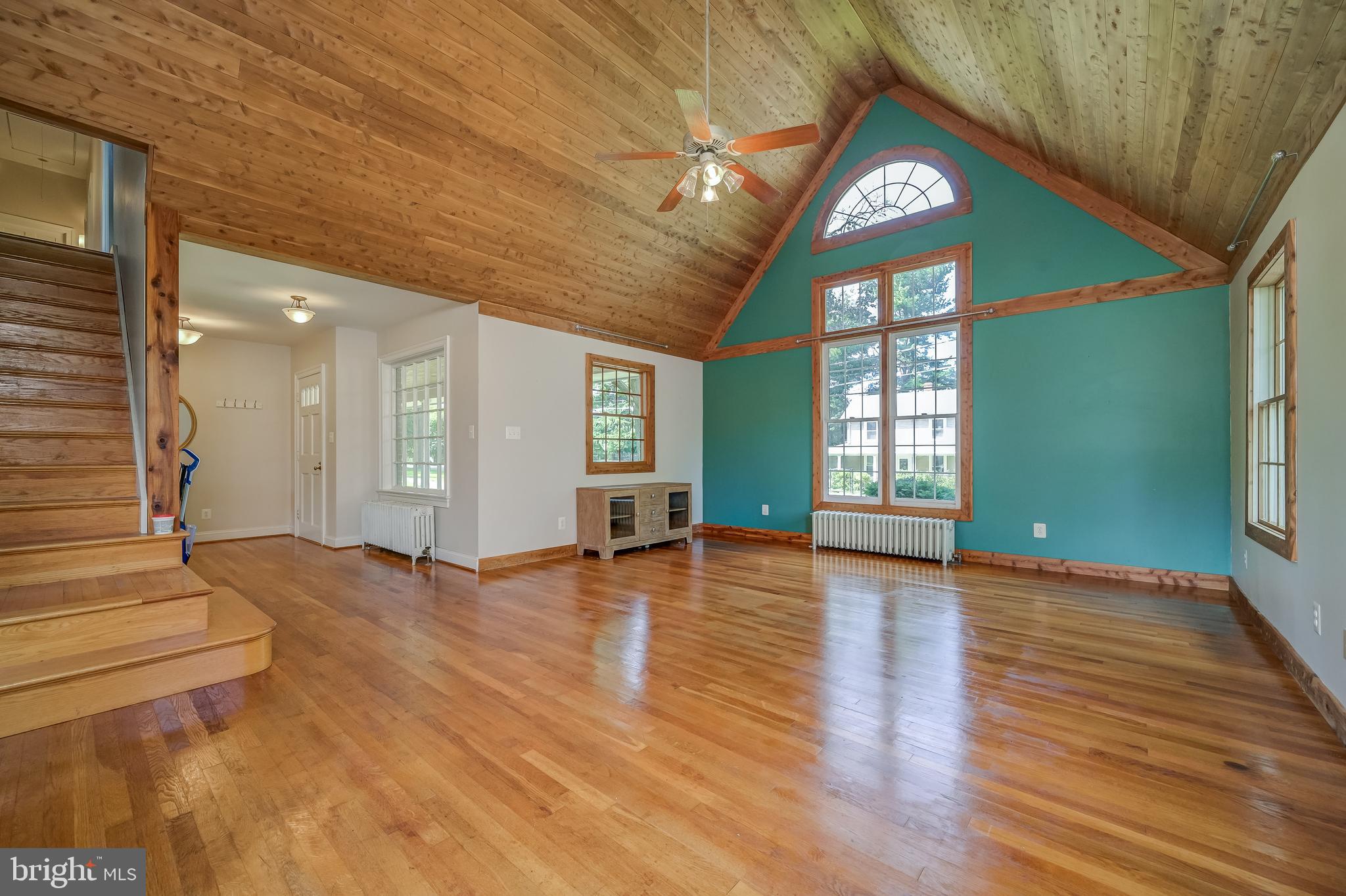 5 Lee Street Gaithersburg, MD 20877 - Photo 13 of 90 a view of an empty room with window and wooden floor