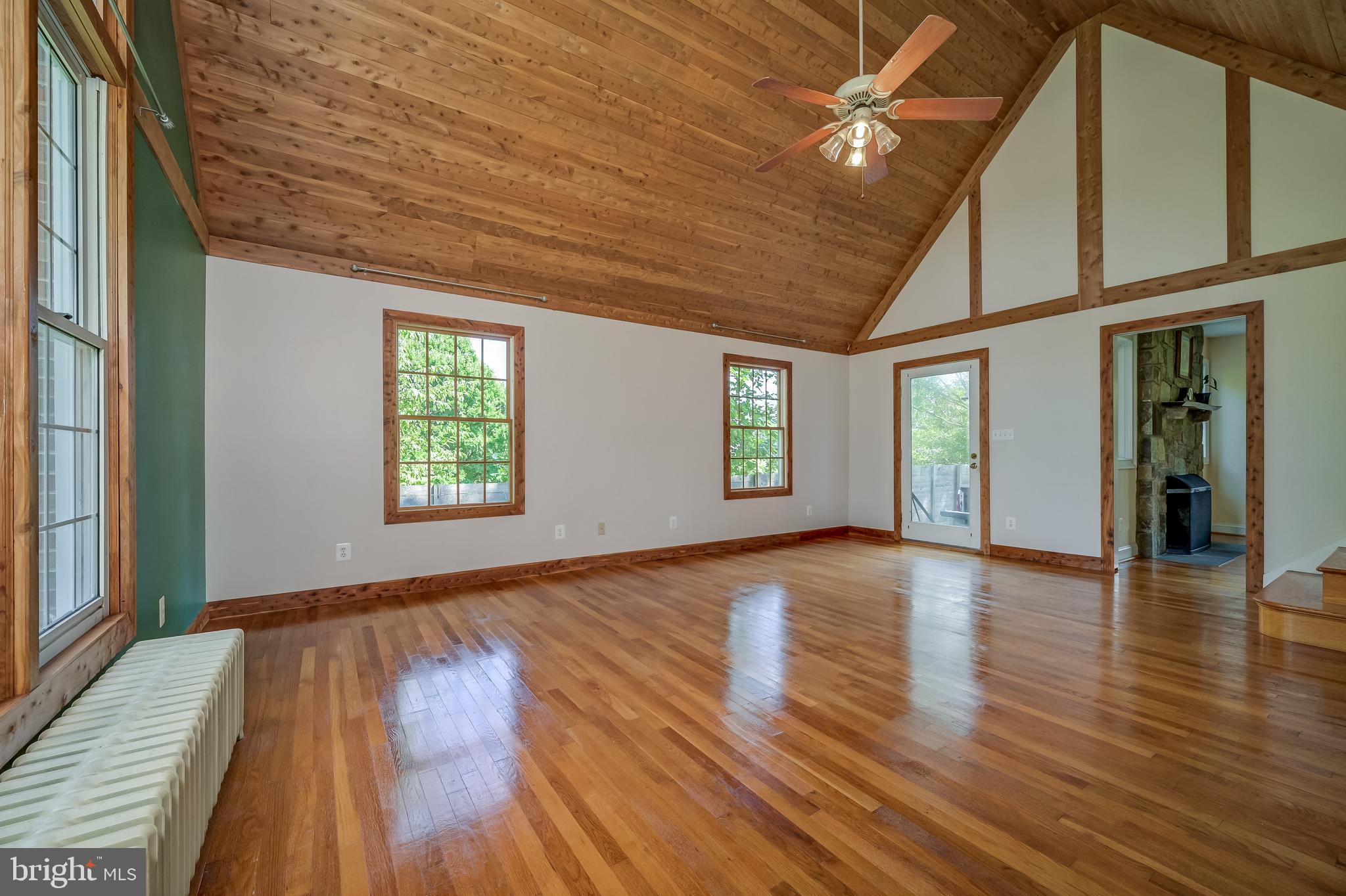5 Lee Street Gaithersburg, MD 20877 - Photo 15 of 90 a view of an empty room with wooden floor and a window