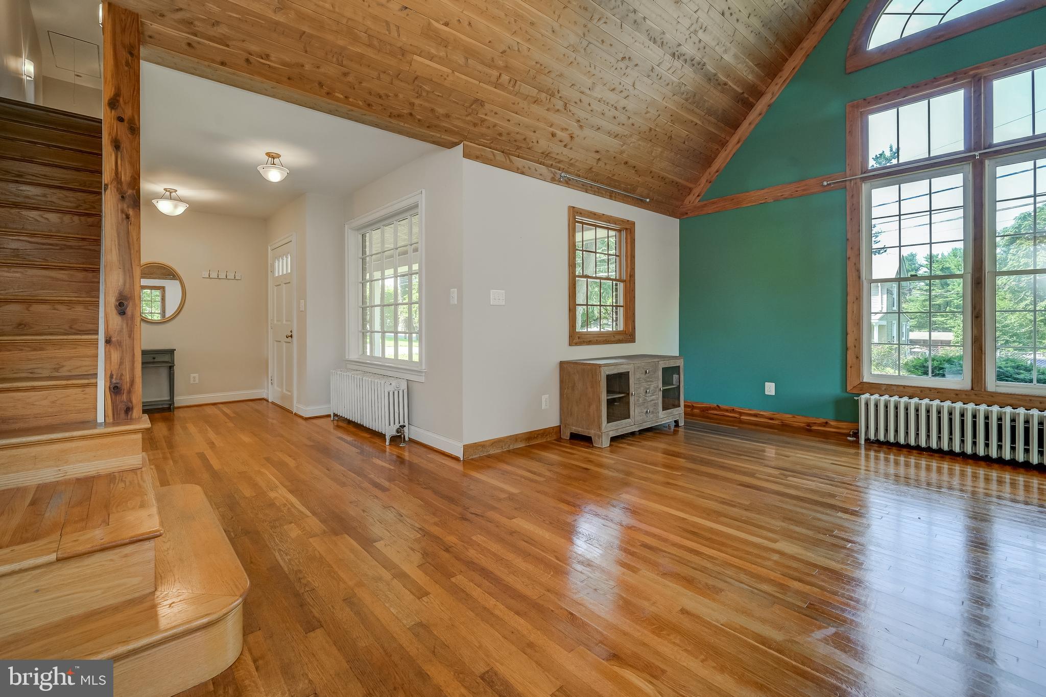 5 Lee Street Gaithersburg, MD 20877 - Photo 17 of 90 a view of an empty room with wooden floor and a window