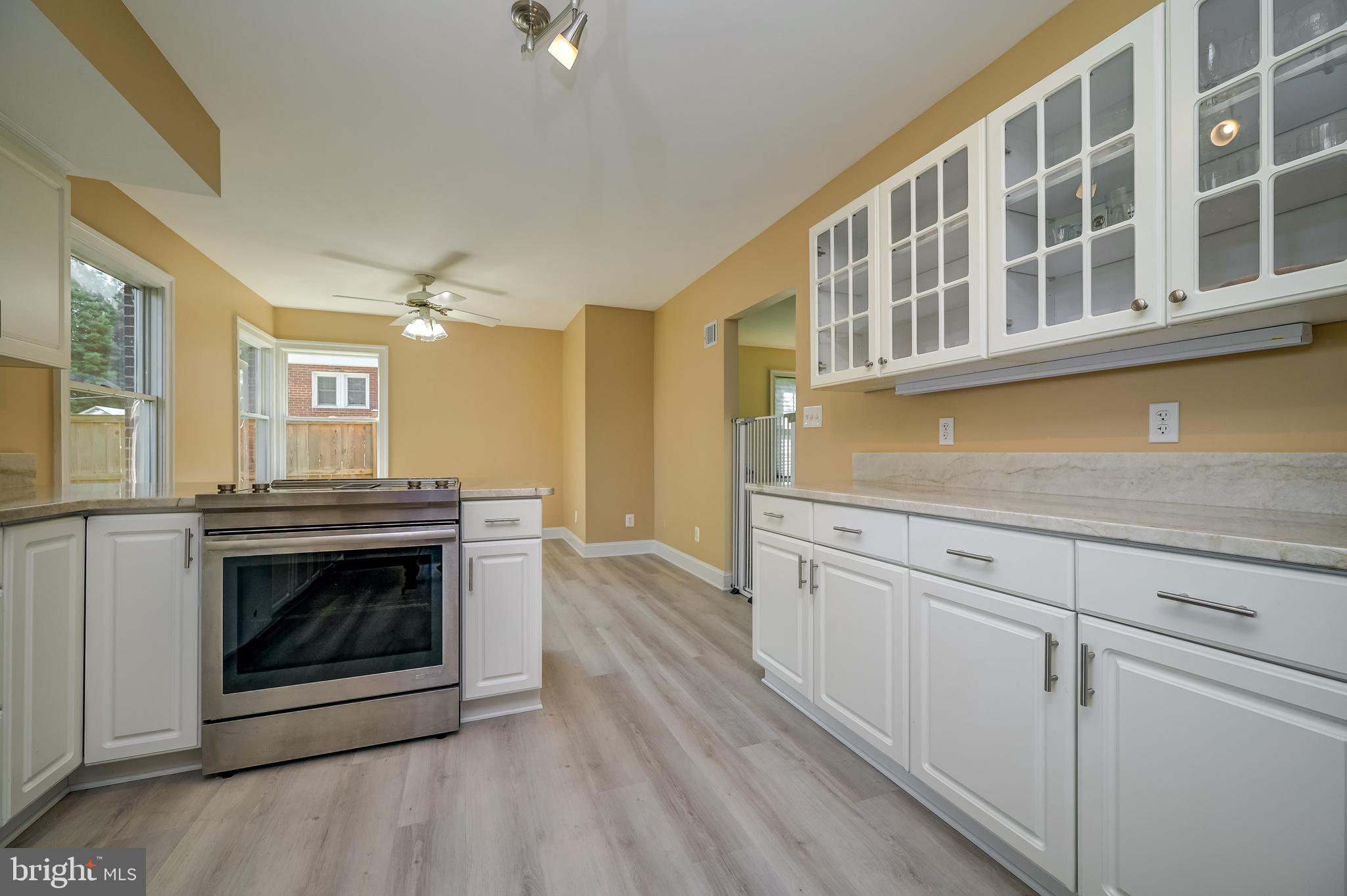 5 Lee Street Gaithersburg, MD 20877 - Photo 25 of 90 a kitchen with stainless steel appliances granite countertop a stove and a sink