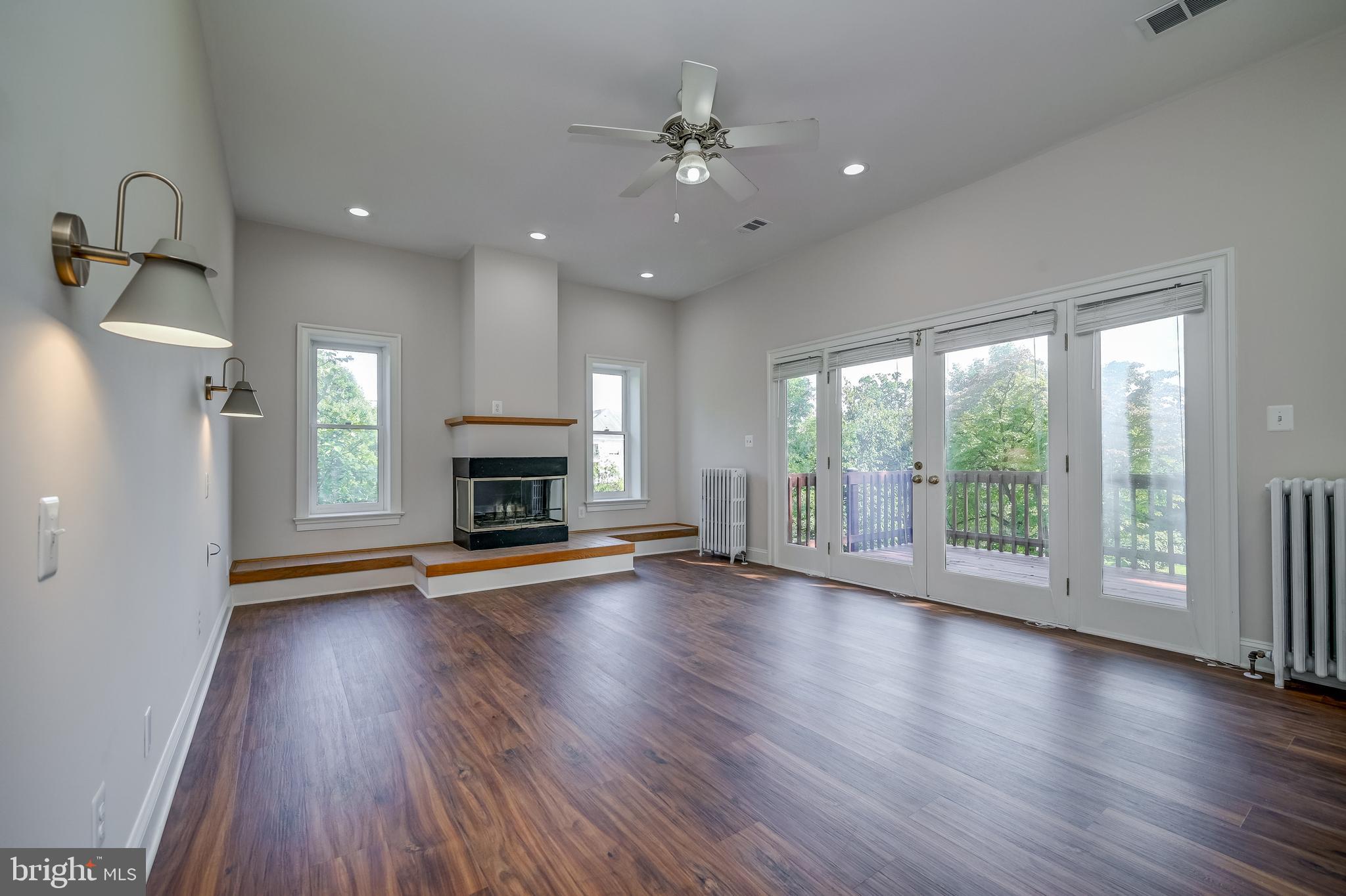 5 Lee Street Gaithersburg, MD 20877 - Photo 38 of 90 a view of an empty room with wooden floor and a window