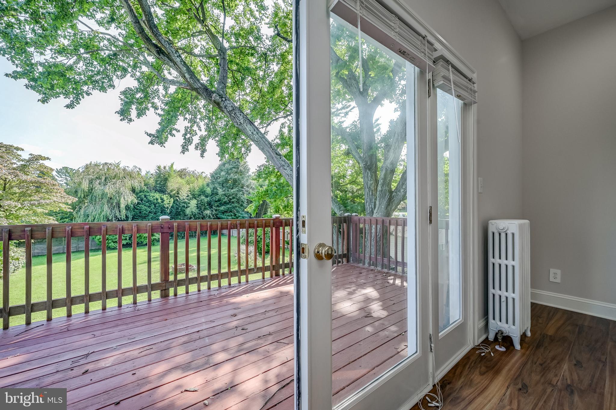 5 Lee Street Gaithersburg, MD 20877 - Photo 42 of 90 a view of a balcony with wooden floor