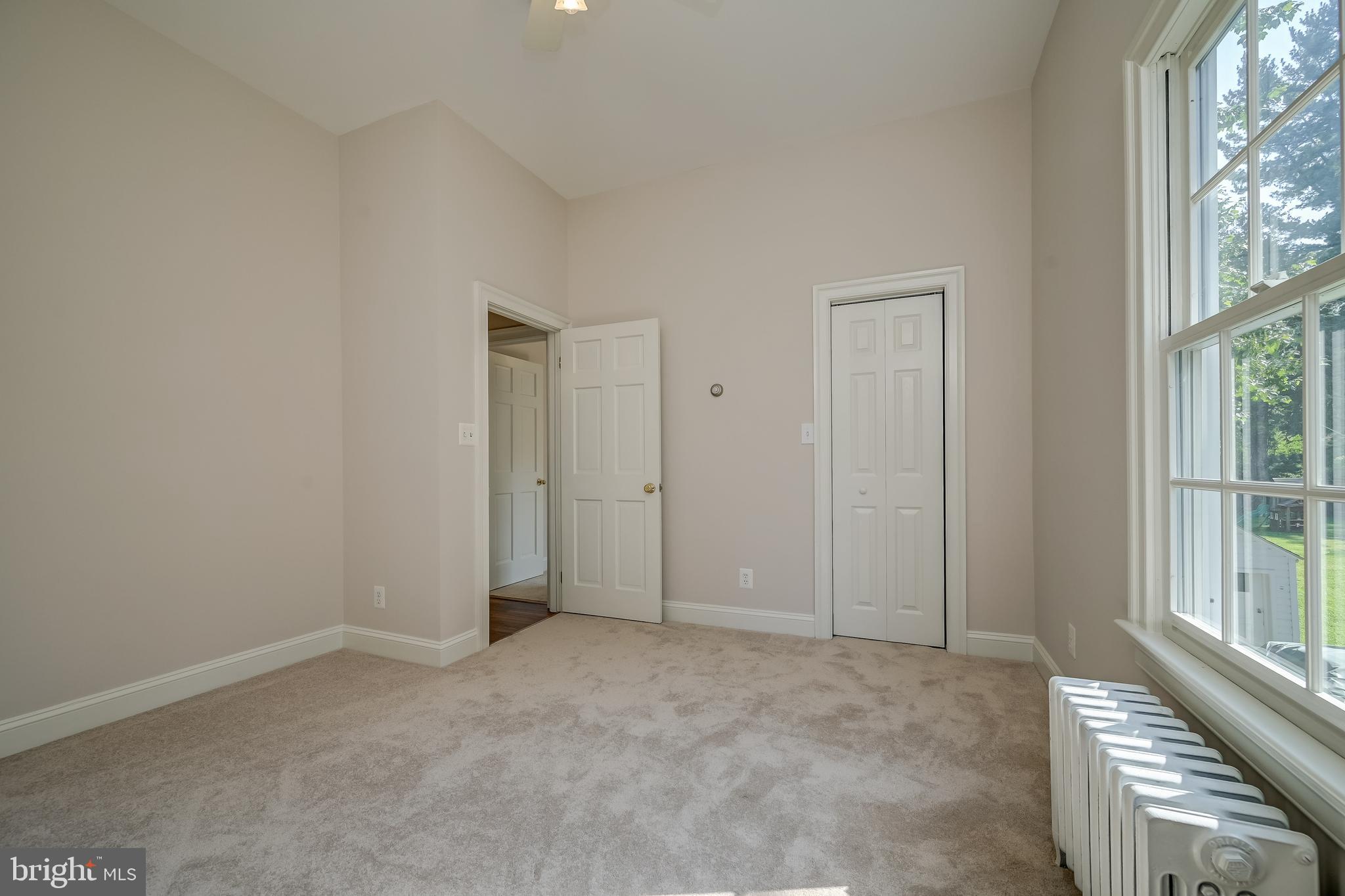 5 Lee Street Gaithersburg, MD 20877 - Photo 60 of 90 a view of an empty room with large windows
