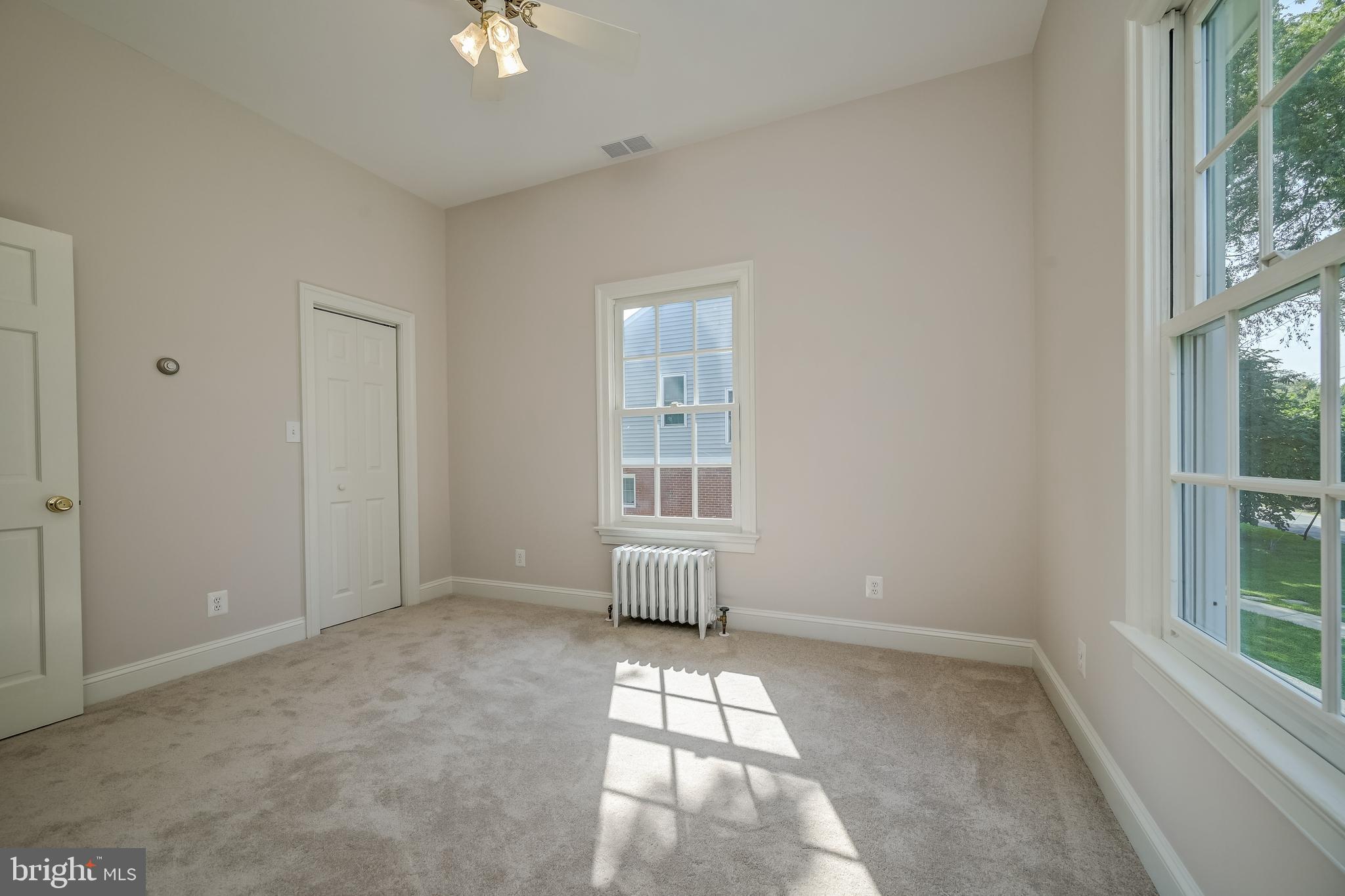 5 Lee Street Gaithersburg, MD 20877 - Photo 61 of 90 an empty room with windows and entrance