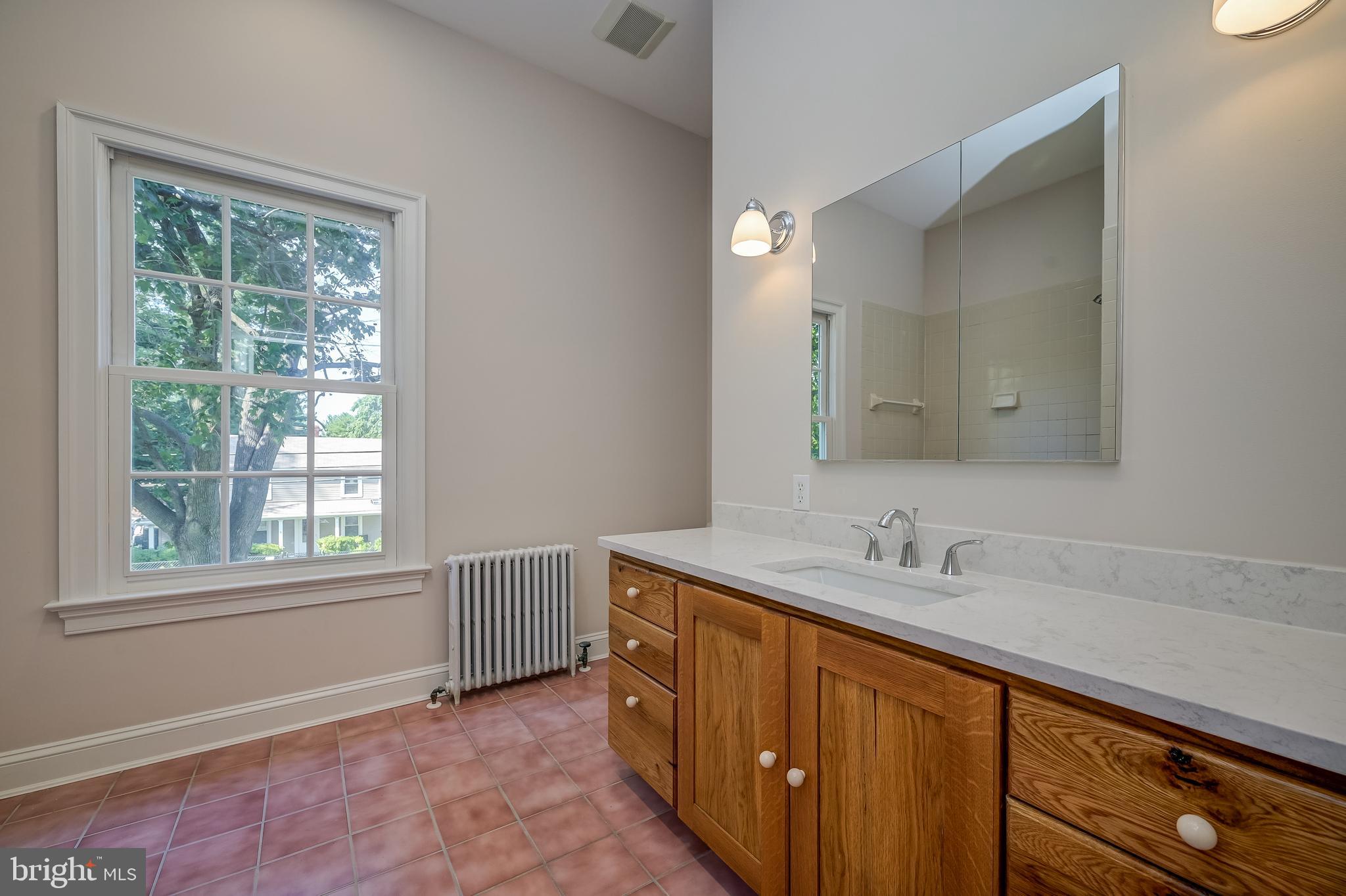 5 Lee Street Gaithersburg, MD 20877 - Photo 62 of 90 a bathroom with a sink double vanity and a mirror