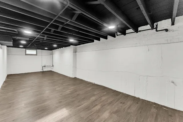 a view of a refrigerator in a room