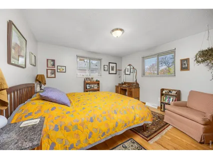 a bed room with a bed and a couch