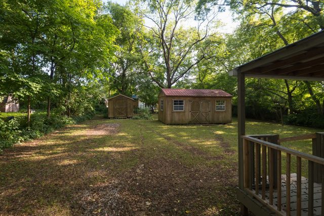 a view of outdoor space and yard