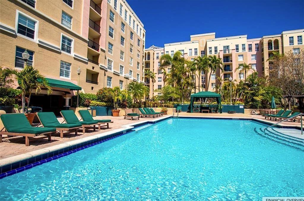 520 Southeast 5th Avenue, Unit 2605 Fort Lauderdale, FL 33301 - Photo 31 of 38 a front view of a building with swimming pool and seating space