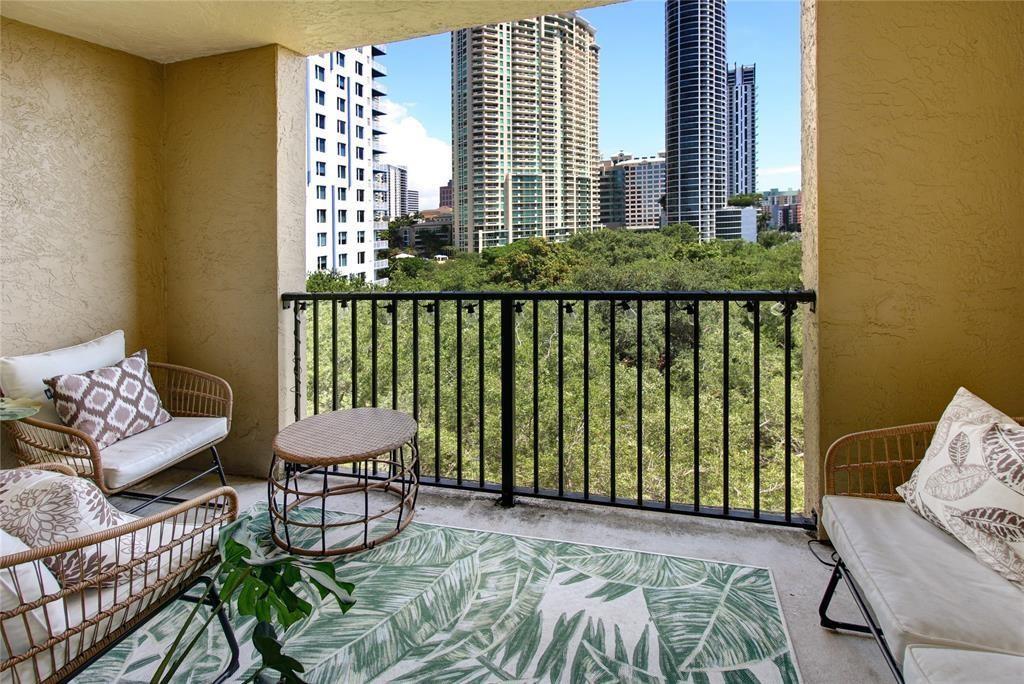 520 Southeast 5th Avenue, Unit 2605 Fort Lauderdale, FL 33301 - Photo 4 of 38 a balcony with furniture and a window