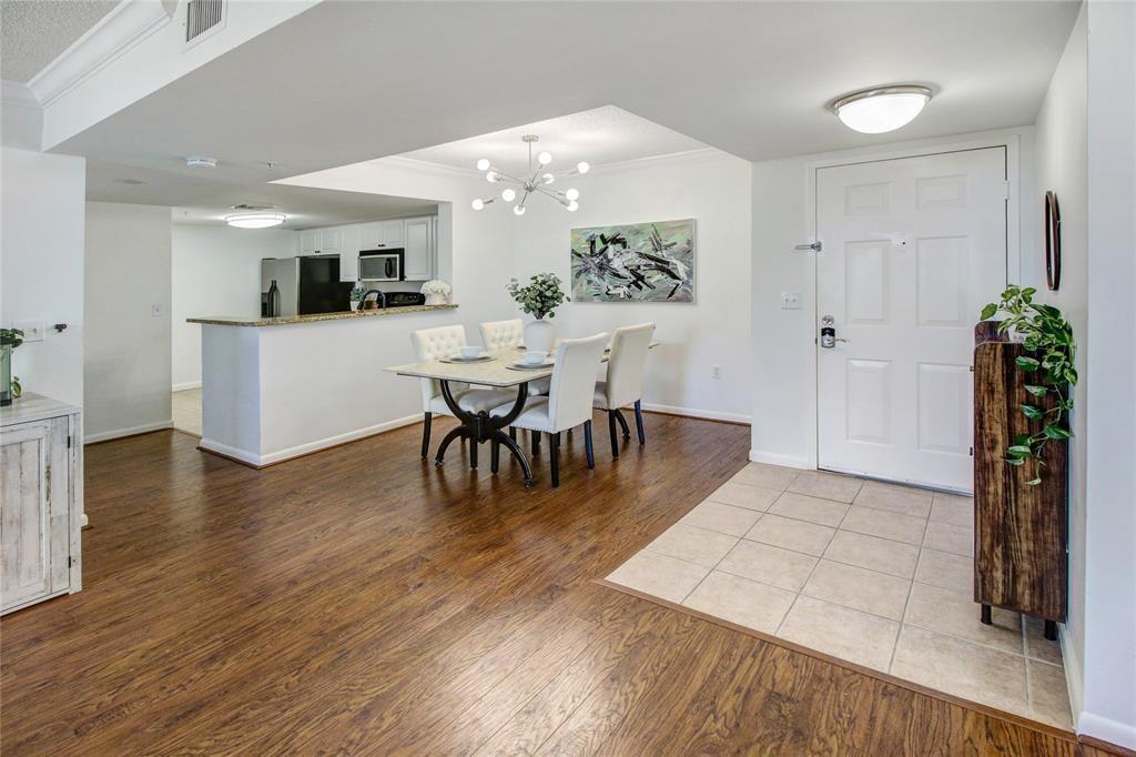 520 Southeast 5th Avenue, Unit 2605 Fort Lauderdale, FL 33301 - Photo 10 of 38 a view of a dining room with furniture and wooden floor