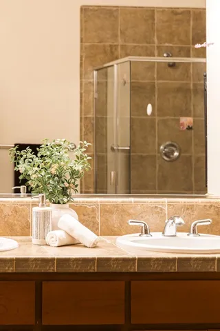 a bathroom with a sink and a mirror