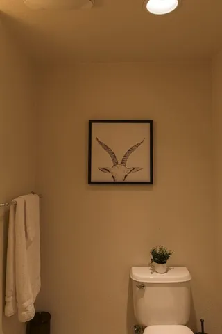 a work room with furniture and a window