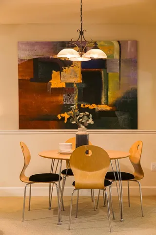 a swimming pool with outdoor seating and yard