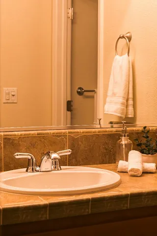 a view of a bathroom with a tub and sink