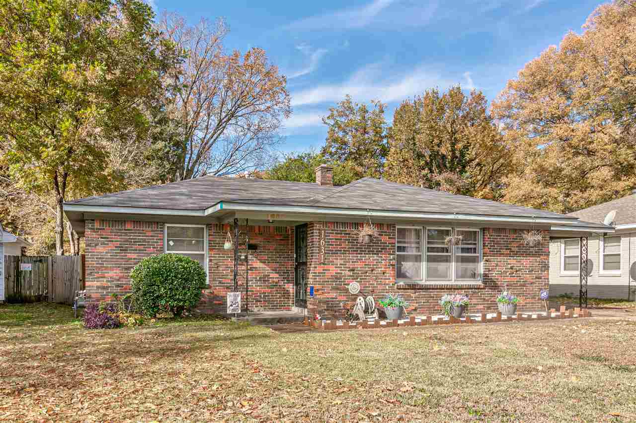 1631 Cranford Road Memphis, TN 38117 - Photo 1 of 21 front view of a house with a yard