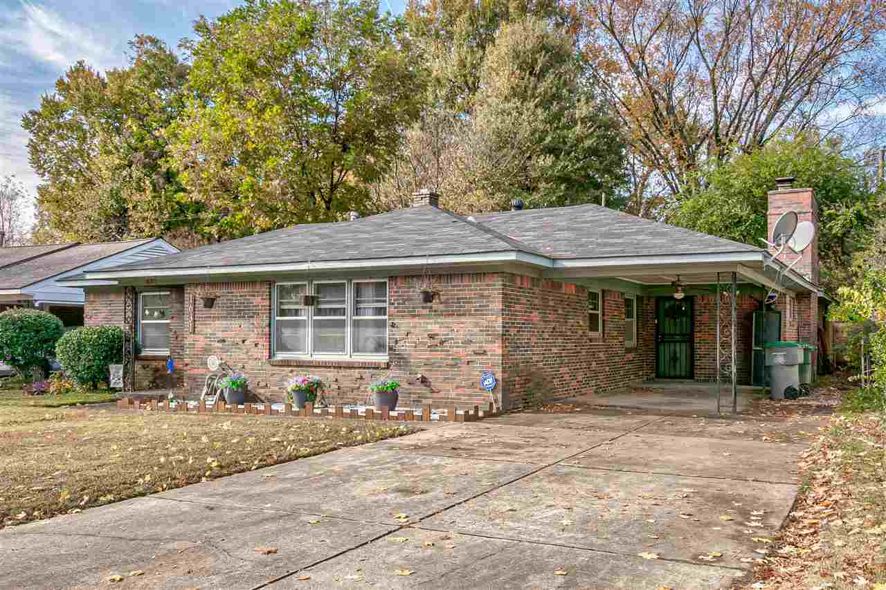 1631 Cranford Road Memphis, TN 38117 - Photo 2 of 21 a front view of a house with garden