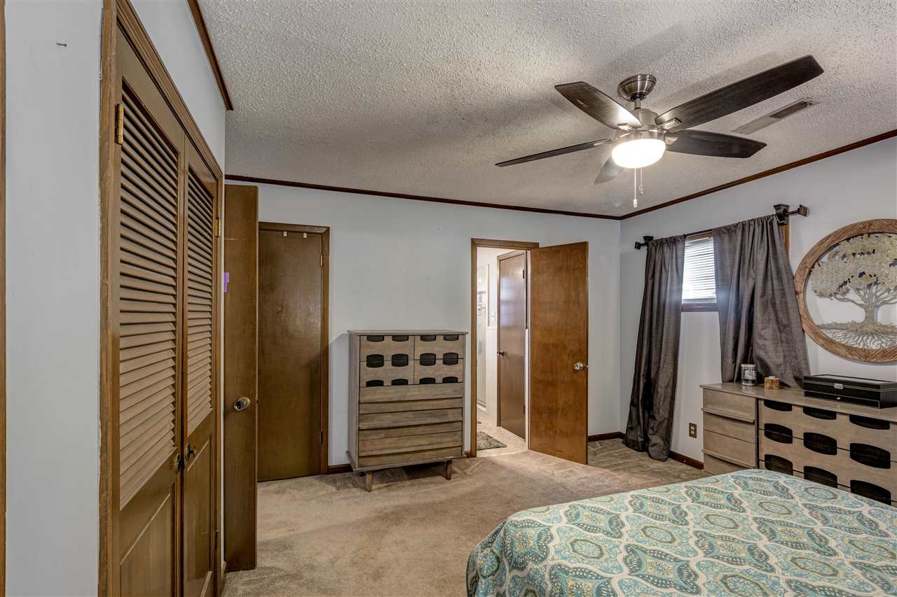 1631 Cranford Road Memphis, TN 38117 - Photo 14 of 21 a bedroom with furniture and a window