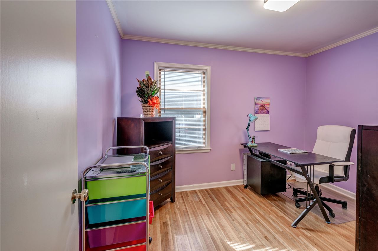 1631 Cranford Road Memphis, TN 38117 - Photo 17 of 21 a view of a workspace with furniture and wooden floor