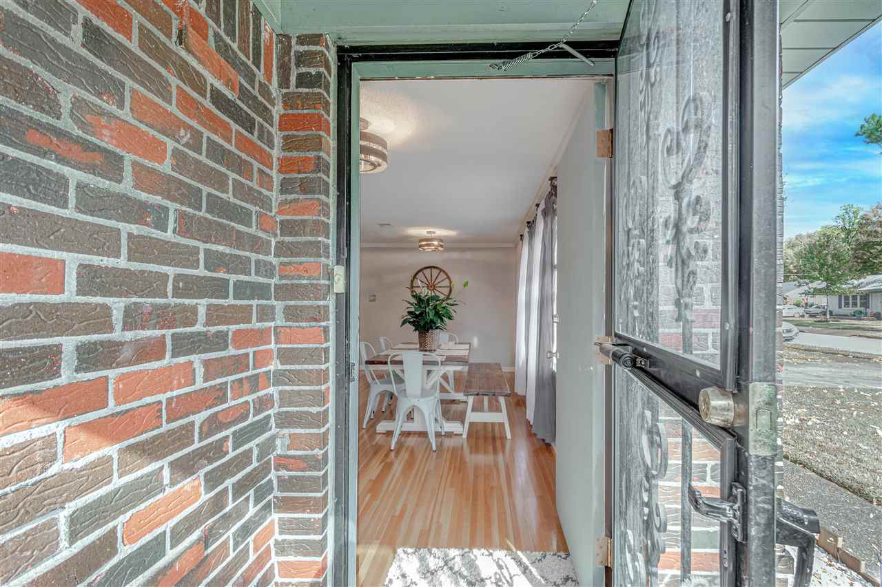 1631 Cranford Road Memphis, TN 38117 - Photo 3 of 21 a view of a balcony with wooden floor