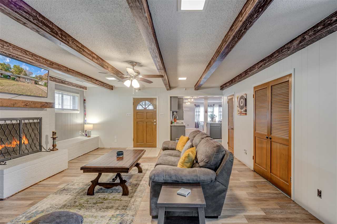 1631 Cranford Road Memphis, TN 38117 - Photo 9 of 21 a living room with furniture and a fireplace