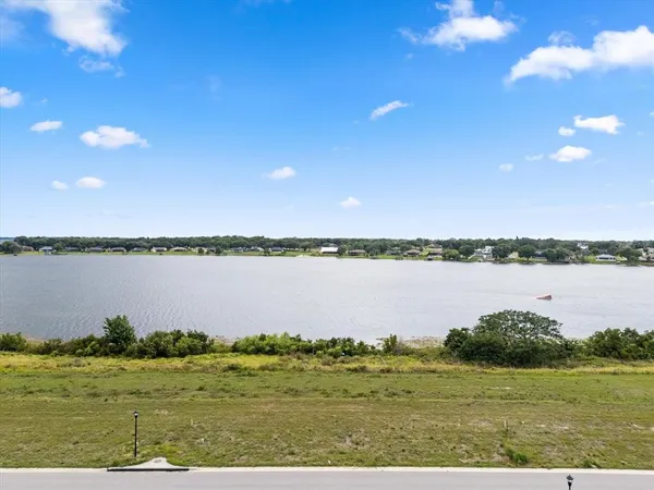 a view of a lake from a yard