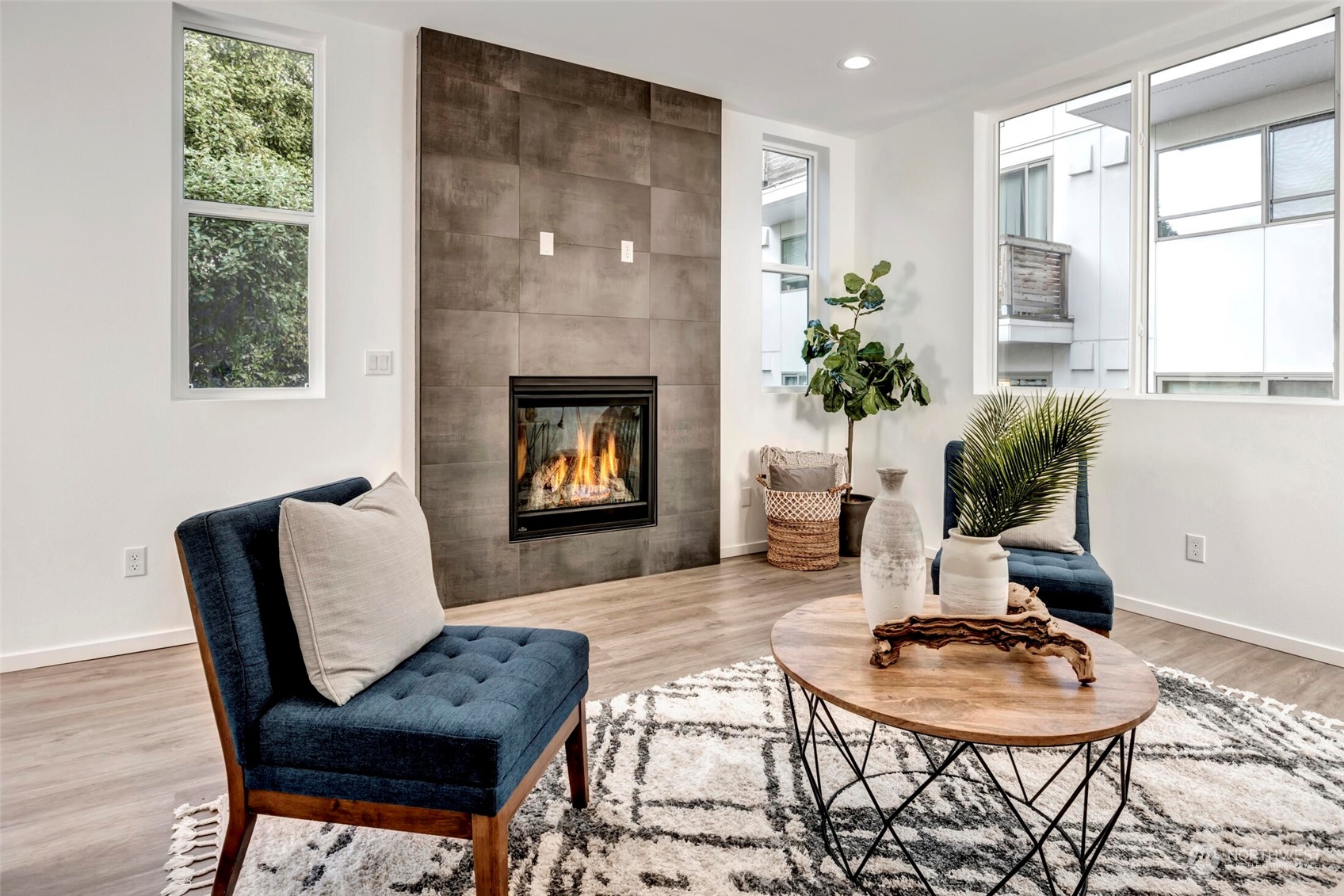 4024 Midvale Avenue North Seattle, WA 98103 - Photo 13 of 26 a living room with furniture and a fireplace