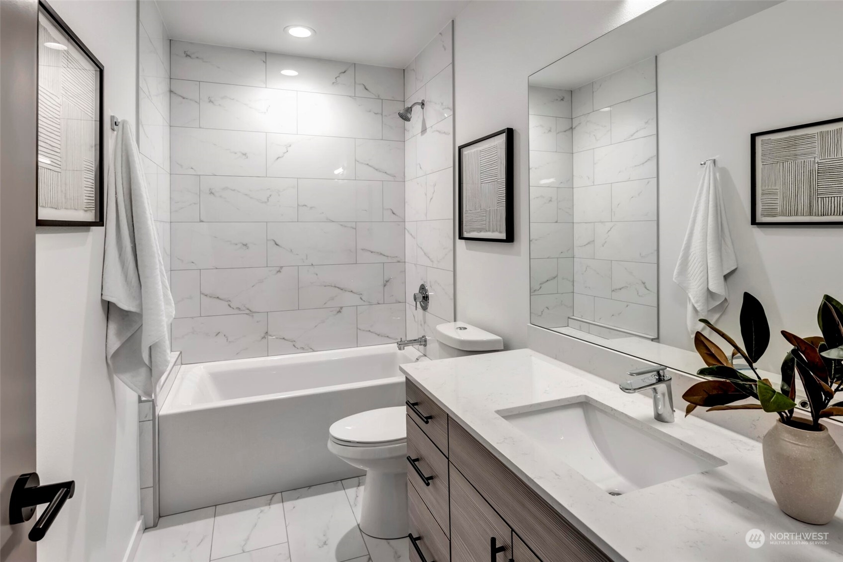 4024 Midvale Avenue North Seattle, WA 98103 - Photo 20 of 26 a bathroom with a sink toilet tub and shower