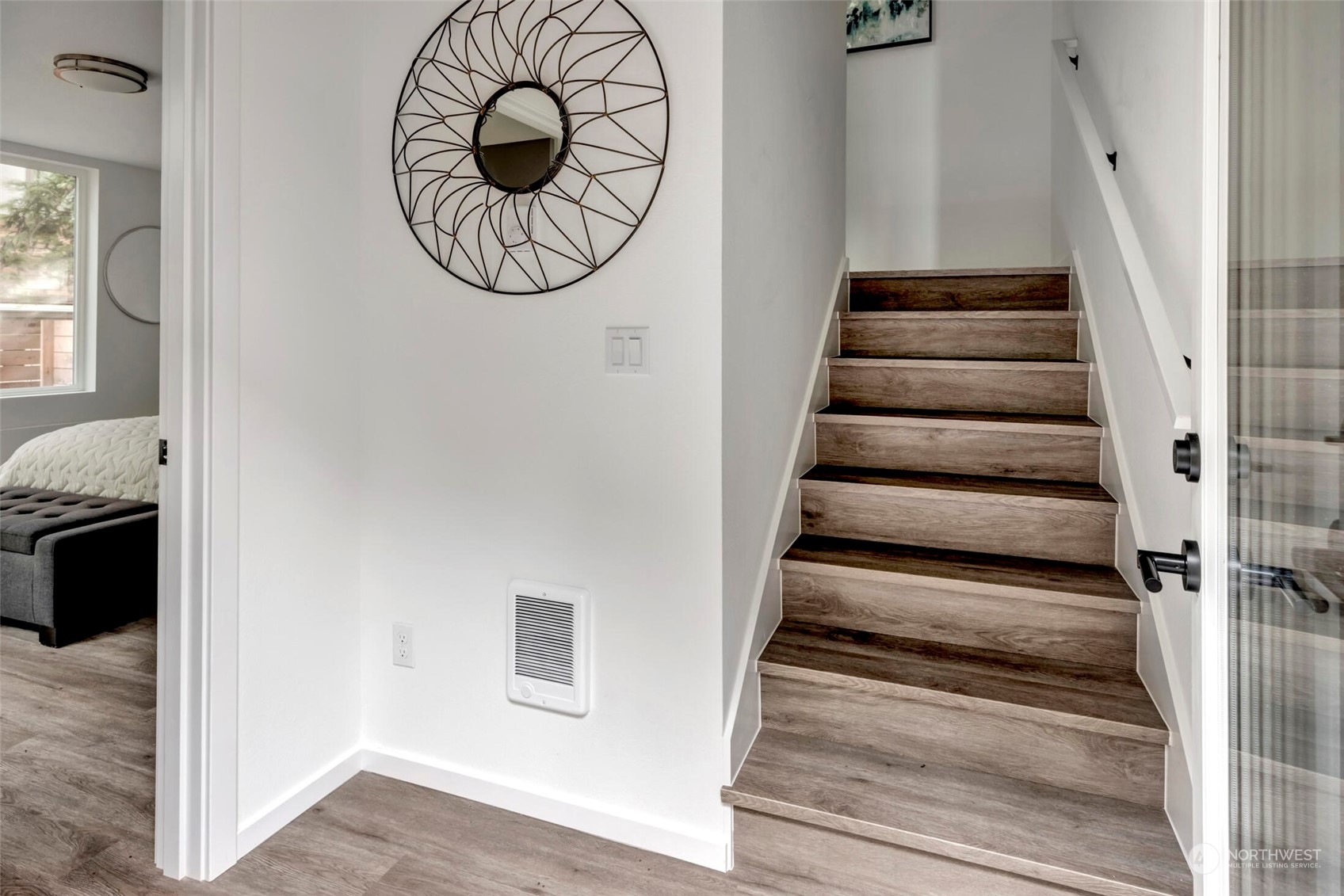 4024 Midvale Avenue North Seattle, WA 98103 - Photo 2 of 26 a view of an entryway with wooden floor