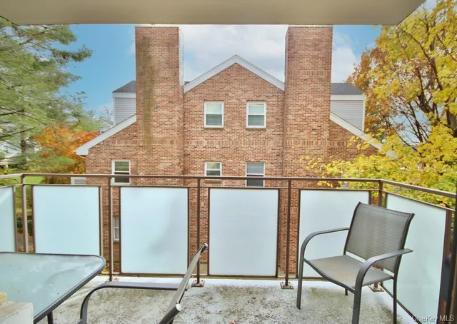 a view of living room with furniture and flat screen tv