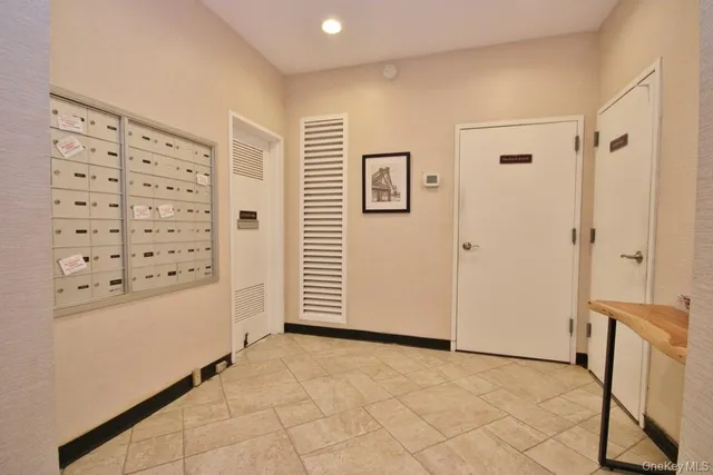 a view of a kitchen with storage and utility room