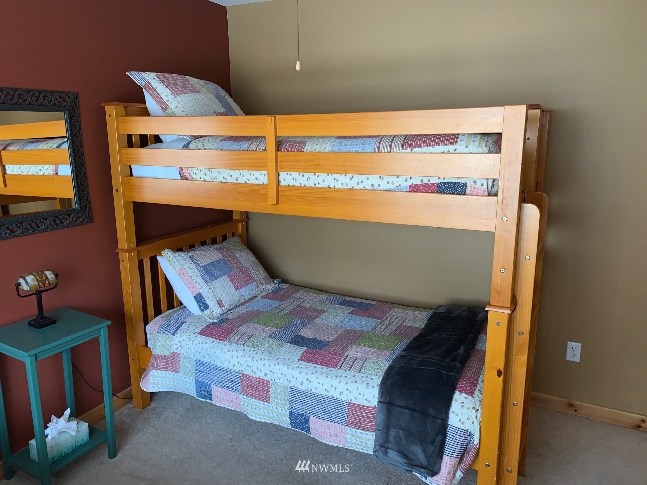 210 Clearwater Loop, Unit 2 Ronald, WA 98940 - Photo 14 of 35 a bed sitting in a bedroom next to a window