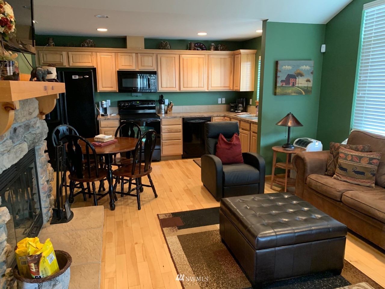 210 Clearwater Loop, Unit 2 Ronald, WA 98940 - Photo 2 of 35 a living room with fireplace furniture and a flat screen tv