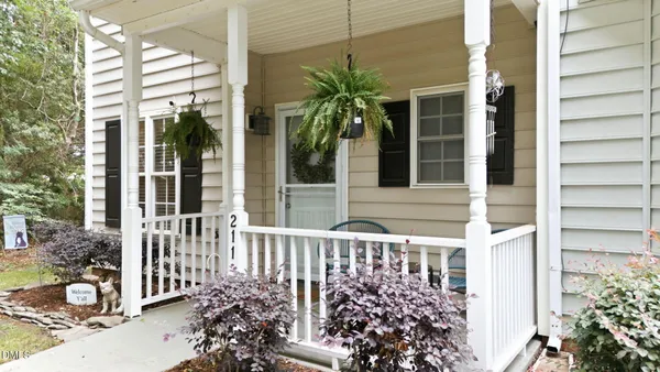 front view of a house with a small garden