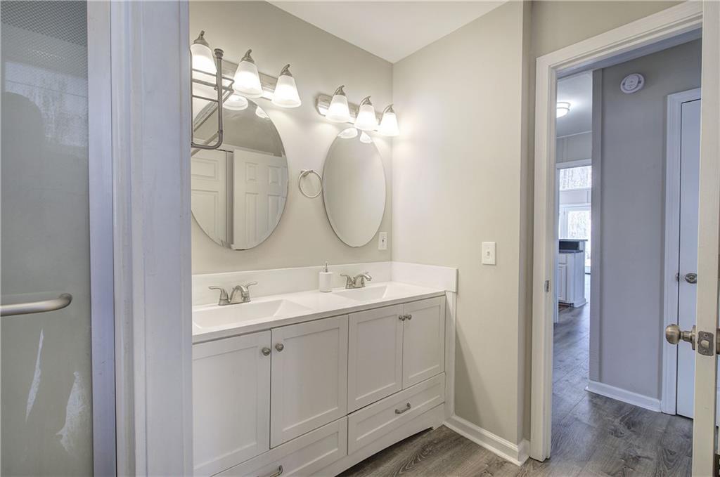 30 Tamarack Court Jasper, GA 30143 - Photo 18 of 70 a bathroom with a double vanity sink mirror and vanity