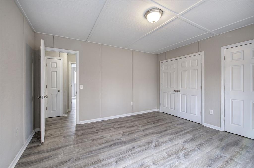 30 Tamarack Court Jasper, GA 30143 - Photo 30 of 70 a view of an empty room with wooden floor