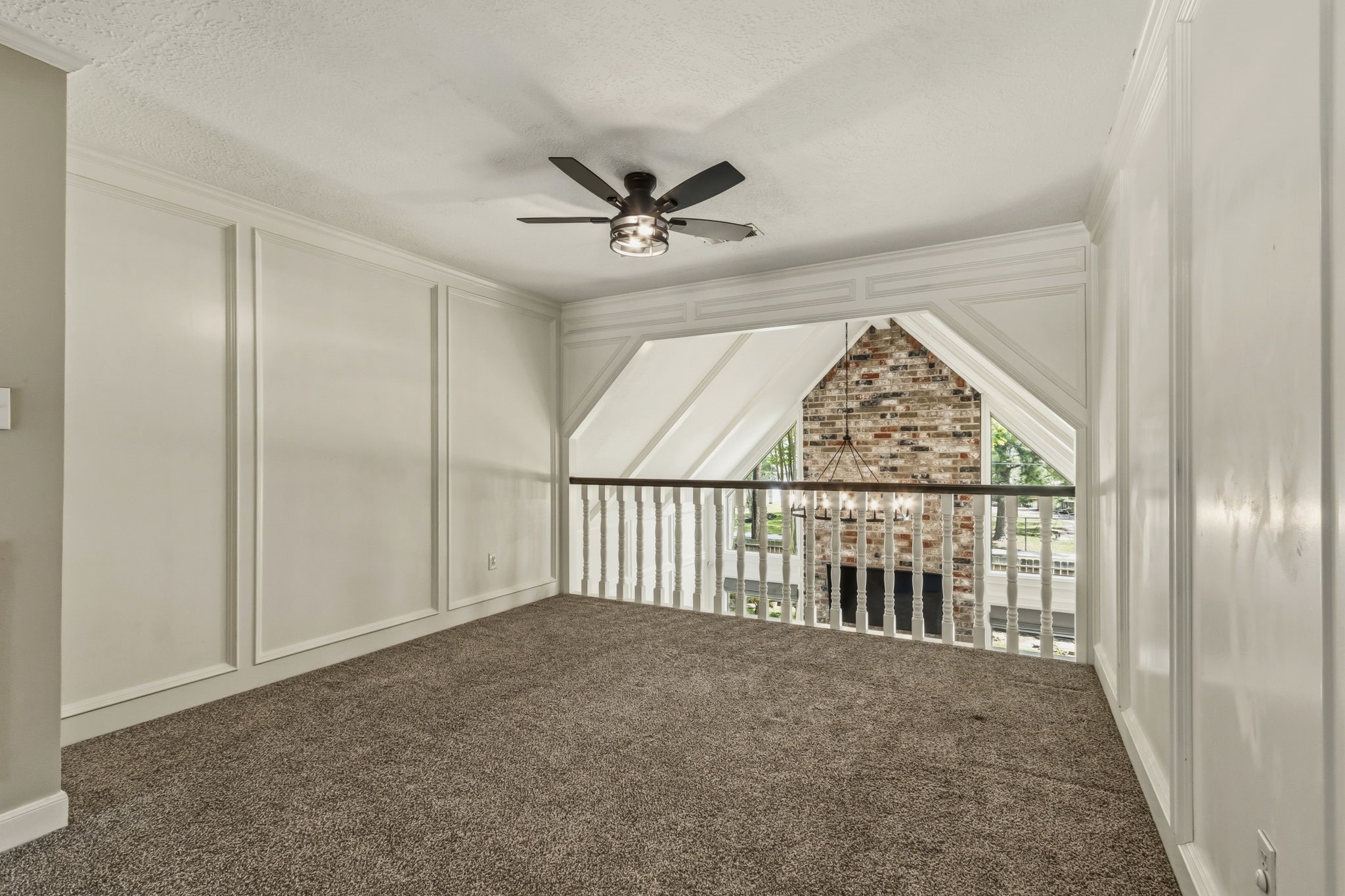 17618 Hidden Forest Drive Spring, TX 77379 - Photo 31 of 49 an empty room with windows and ceiling fan