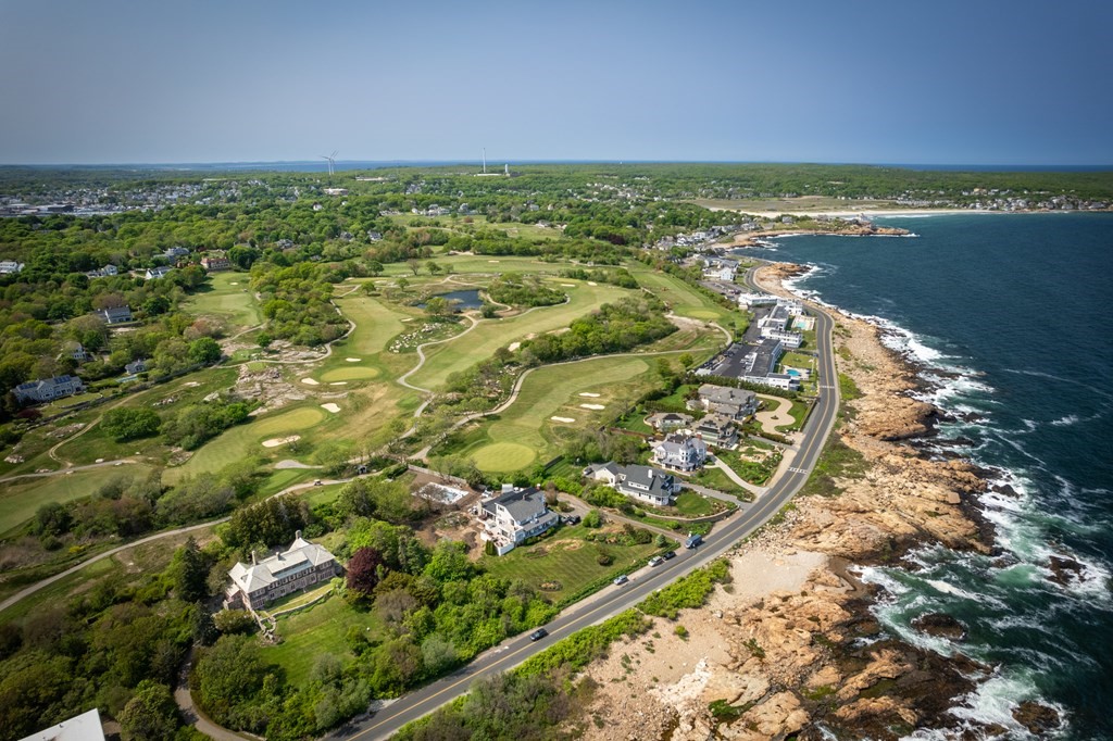 145 Atlantic Road Gloucester, MA 01930 - Photo 4 of 32 an aerial view of residential houses with outdoor space and swimming pool