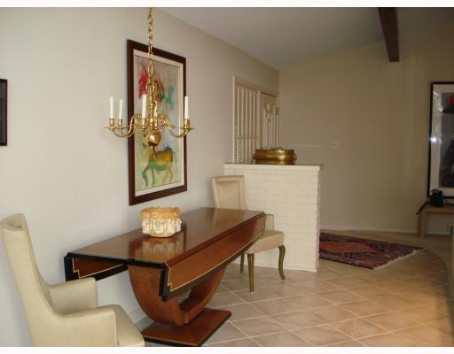 310 Buckingham Road Fox Chapel, PA 15215 - Photo 3 of 12 Dining Room. Tile flooring, peaked ceiling with beams, and a credenza with recessed lighting.