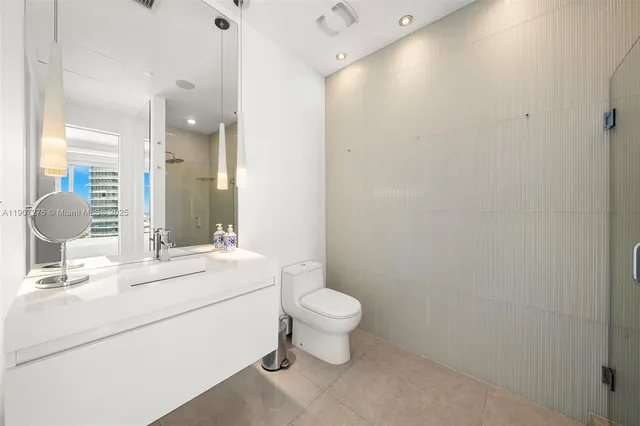 a view of a patio with a table chairs and a table