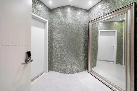 a view of a swimming pool with a plant