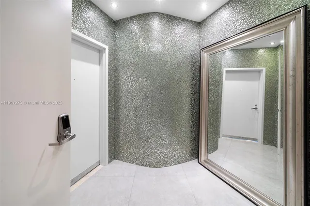 a view of a swimming pool with a plant