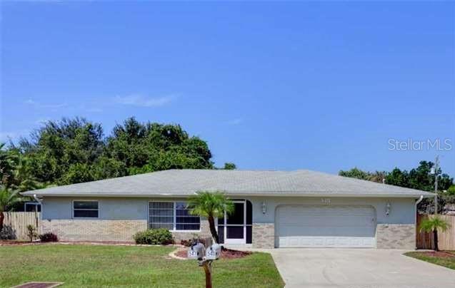 540 Flamingo Road Venice, FL 34293 - Photo 1 of 1 front view of a house with a yard
