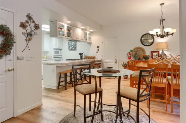 a view of a dining room and a table and chairs