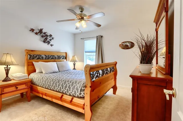 a bathroom with a sink and a mirror with toilet
