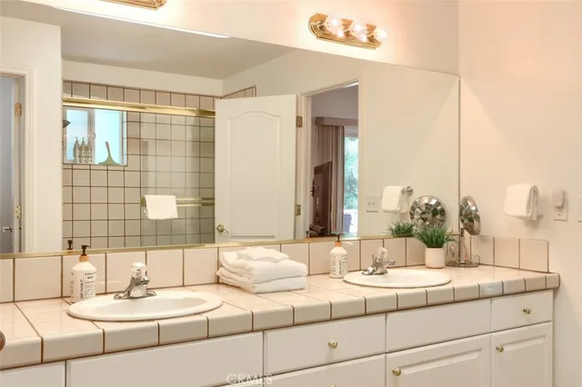 a view of a chairs and table in backyard