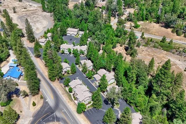 a view of a porch with chairs and backyard