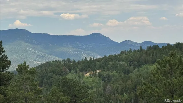 a view of a house with mountain view